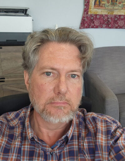 Portrait of Dr. David Hamilton, psychiatrist specializing in trauma therapy, PTSD treatment, and innovative mental health care approaches.