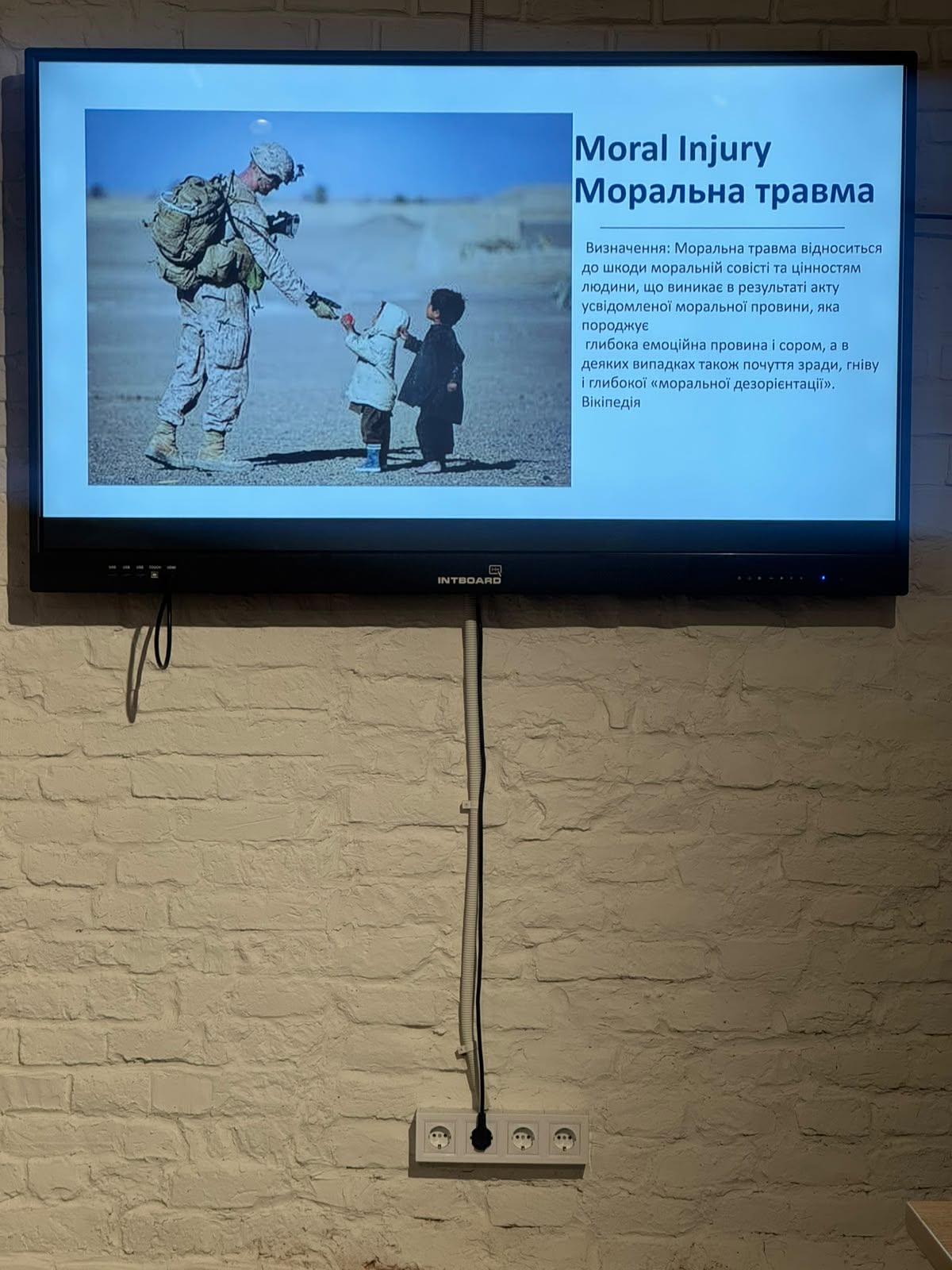Moral Injury Training Slide Screen showing a moral injury training slide during a Project Trauma Support session in Ukraine.