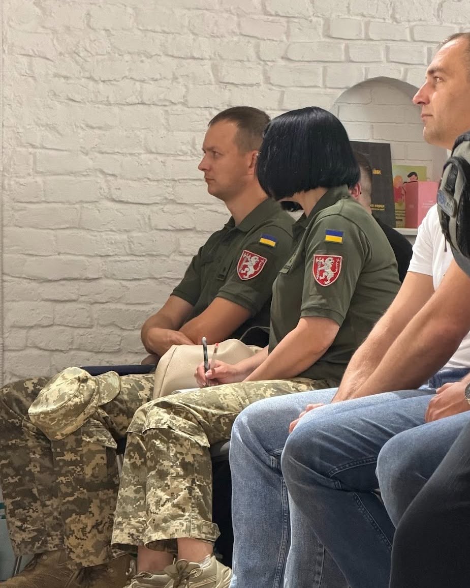 Ukrainian Military Attendees at Workshop Ukrainian military members seated during a Project Trauma Support trauma recovery workshop.